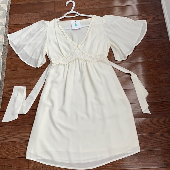 Seraphine Dresses & Skirts - Off-White Seraphine Flutter Maternity Dress